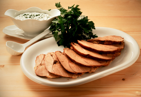 Roasted lamb with mint-garlic yogurt sauce makes a delicious and easy roasted lamb sandwich