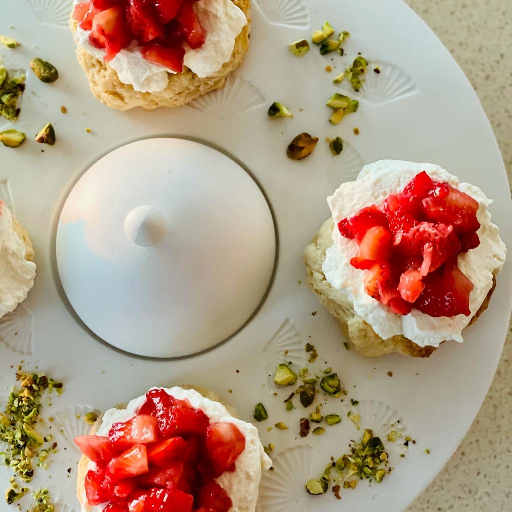 strawberry shortcakes served on a plate 